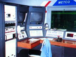 The above console-with custom built I/O hardware and seperate alarm and control consoles -is being replaced by a single operator interface.